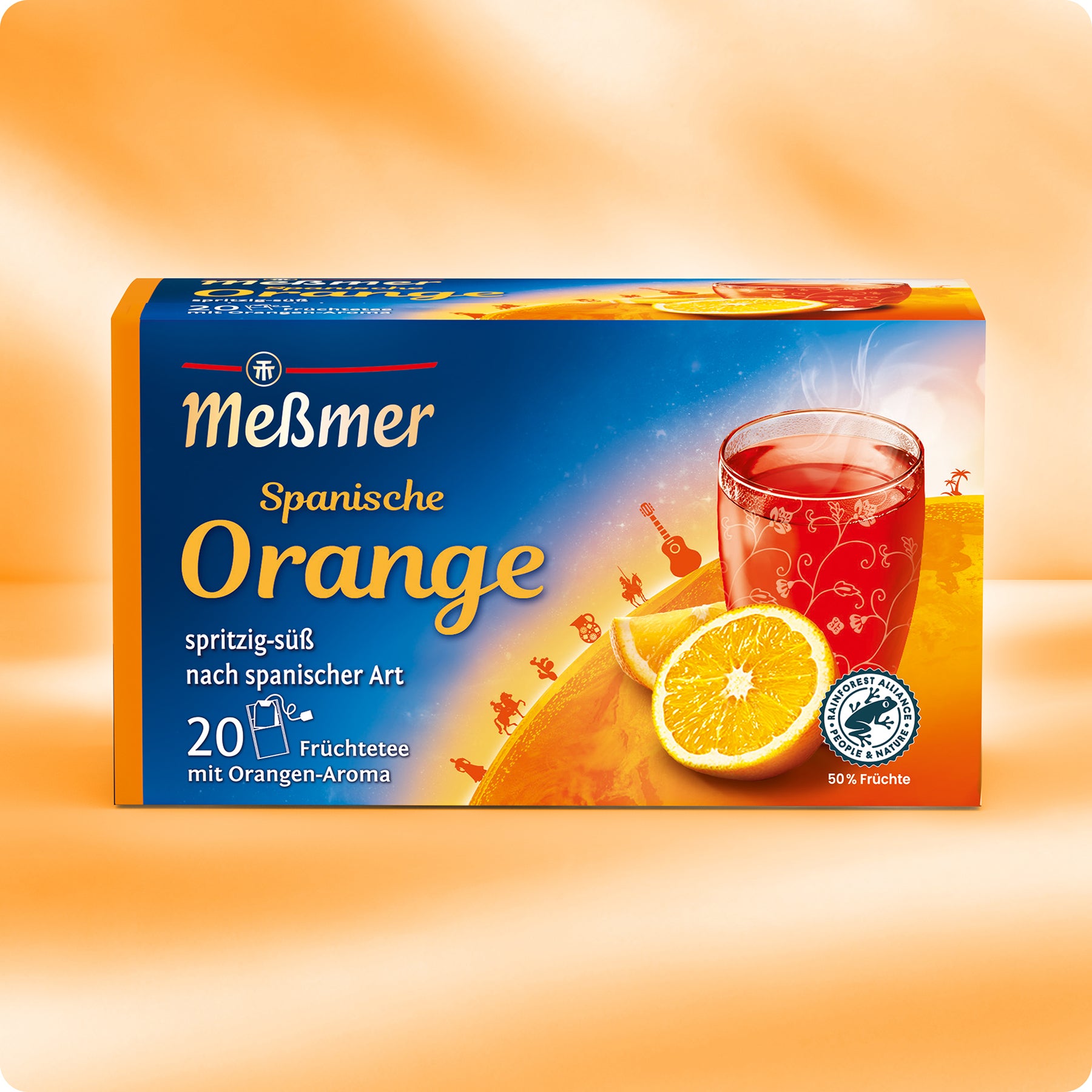 Eine Meßmer DE Spanische Orange Schachtel zeigt ein Glas Orangentee mit Orangenscheiben auf einem lebendigen Hintergrund, der 20 Früchteteebeutel und den kräftigen Geschmack der Spanischen Orange hervorhebt.