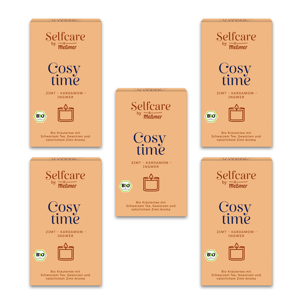 Fünf Packungen Bio Cosy time mit Zimt, Kardamom und Ingwer, Bio-Kräutertee mit schwarzem Tee und natürlichem Zimt-Aroma in beige-orangefarbener Verpackung.