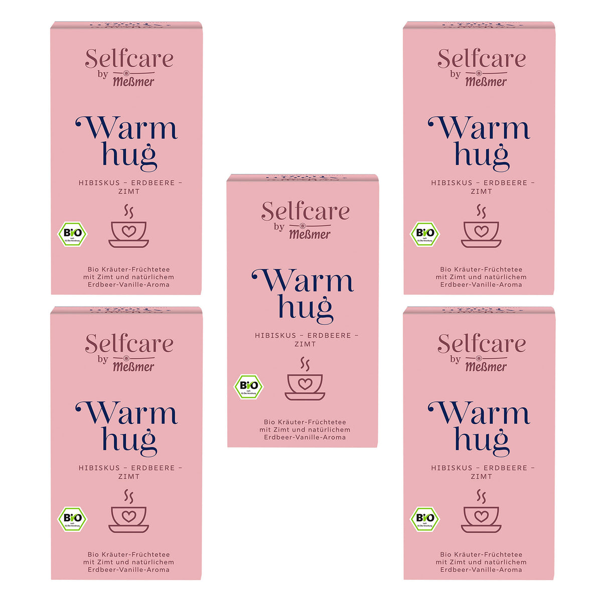 Verpackungen von Bio Warm hug mit Bio-Siegel, Hibiskus, Erdbeere und Zimt, abgebildet vor weißem Hintergrund mit Hinweis auf natürlichen Früchte- und Vanilleduft.